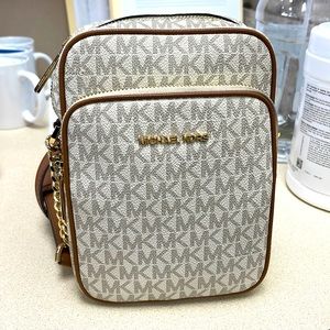 White, beige and brown Michael kors bag